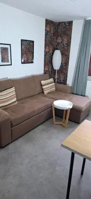 Ein Sitzbereich in der Unterkunft Hochwald appartement