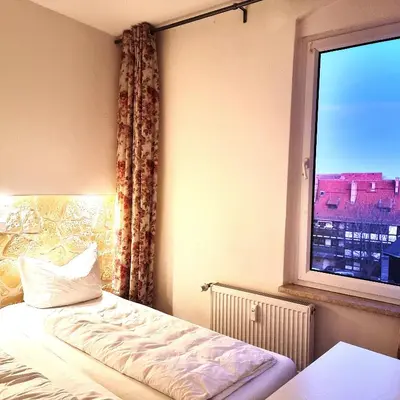 Ein Bett oder Betten in einem Zimmer der Unterkunft Apartment am Rathaus