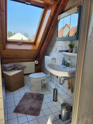 Ein Sitzbereich in der Unterkunft Ferienwohnung 2 Berliner Platz