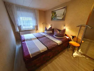 Ein Bett oder Betten in einem Zimmer der Unterkunft FewoJunkernberg
