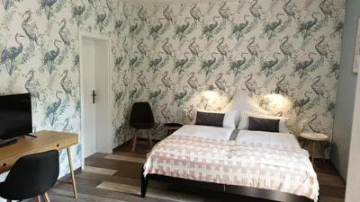 Ein Bett oder Betten in einem Zimmer der Unterkunft Hotel Bodethal