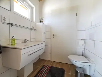 Ein Badezimmer in der Unterkunft Ferienhäuser-Klapproth