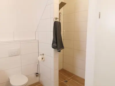 Ein Badezimmer in der Unterkunft Ferienhäuser-Klapproth