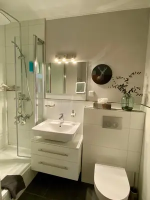 Ein Badezimmer in der Unterkunft Seeblickappartement -Eure Zeit- mit Balkon