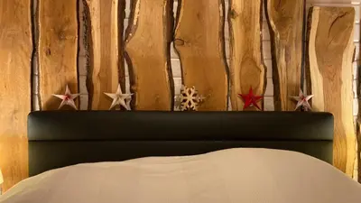 Ein Bett oder Betten in einem Zimmer der Unterkunft Blockhaus Kik im Harz