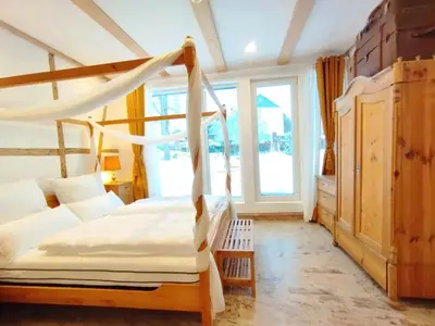 Ein Bett oder Betten in einem Zimmer der Unterkunft Unik Villa - Fewo im Oberharz Frühstück Halbpension buchbar