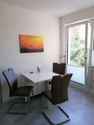 Ein Sitzbereich in der Unterkunft Ferienwohnung 'Auszeit Parkresidenz'