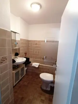 Ein Badezimmer in der Unterkunft Ferienwohnung 'Auszeit Parkresidenz'