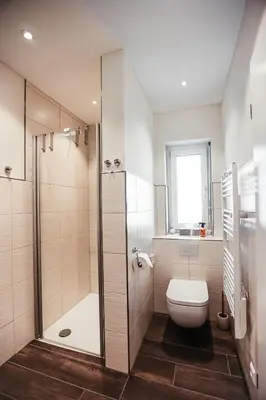 Ein Badezimmer in der Unterkunft Talblick 5, mit Sauna und wunderschönen Panoramablick NEU