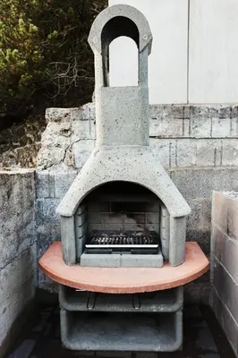 Ein für Gäste verfügbarer Grill im Ferienhaus