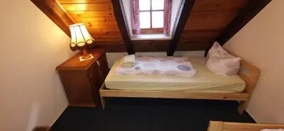 Ein Bett oder Betten in einem Zimmer der Unterkunft Ferienwohnungen Christel