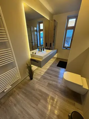 Ein Badezimmer in der Unterkunft Stilapartment City 2