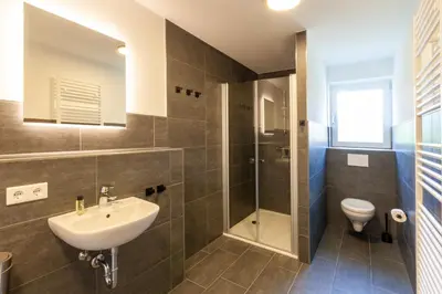 Ein Badezimmer in der Unterkunft Ferienwohnung WurmbergQuartier mit Terrasse und Grill