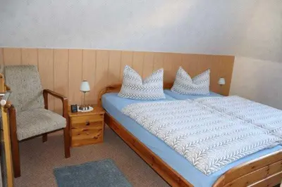 Ein Bett oder Betten in einem Zimmer der Unterkunft Ferienwohnung Haus Matschek