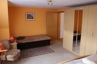 Ein Bett oder Betten in einem Zimmer der Unterkunft Ferienwohnung Peinemann