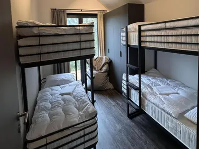 Ein Bett oder Betten in einem Zimmer der Unterkunft modernes Chalet in Hahnenklee