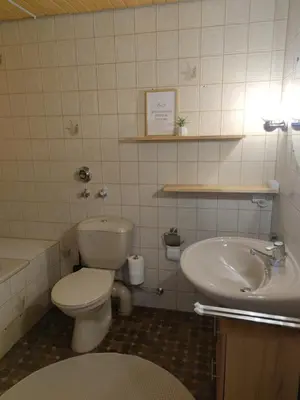 Ein Badezimmer in der Unterkunft Jesses Harzsuite
