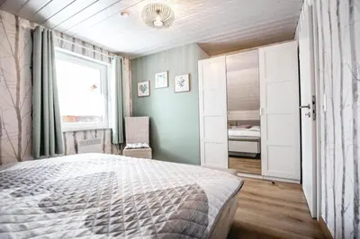 Ein Bett oder Betten in einem Zimmer der Unterkunft Glanzstück