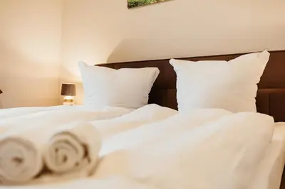 Ein Bett oder Betten in einem Zimmer der Unterkunft Gutshof zu Quedlinburg