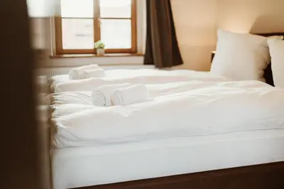 Ein Bett oder Betten in einem Zimmer der Unterkunft Gutshof zu Quedlinburg