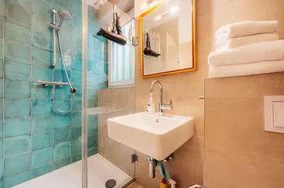 Ein Badezimmer in der Unterkunft Goldener Hirsch Braunlage