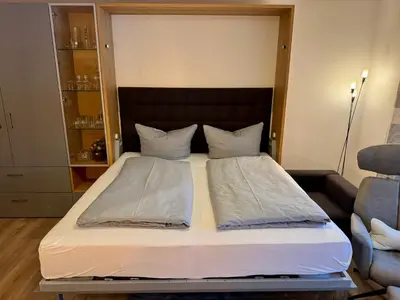 Ein Bett oder Betten in einem Zimmer der Unterkunft Gipfelblick Apartment
