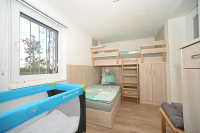 Ein Bett oder Betten in einem Zimmer der Unterkunft Ferienhaus Fuchswinkel