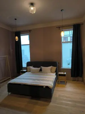 Ein Bett oder Betten in einem Zimmer der Unterkunft New studio-style holiday apartment in the historic old town of Quedlinburg
