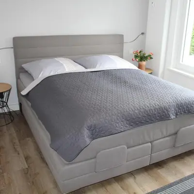 Ein Bett oder Betten in einem Zimmer der Unterkunft Wohnung Hahnenklee