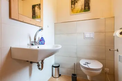 Ein Badezimmer in der Unterkunft Auerhahn Ferienhäuser Auerhahn 515