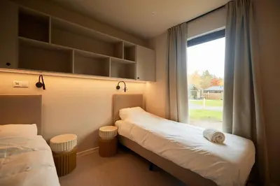 Ein Bett oder Betten in einem Zimmer der Unterkunft Harz Eco Lodges