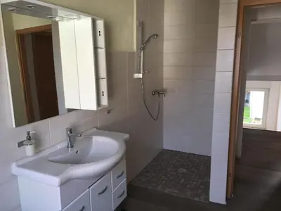 Ein Badezimmer in der Unterkunft Ferienhaus Bülow