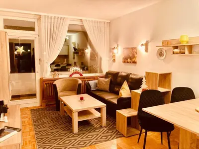 Ein Sitzbereich in der Unterkunft Fewo Hemlock, mit Balkon