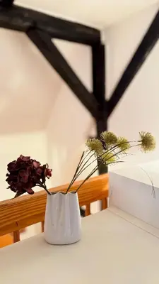 Ein Bett oder Betten in einem Zimmer der Unterkunft Bleibe am Kirchhof