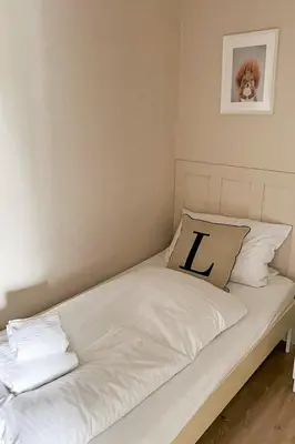 Ein Bett oder Betten in einem Zimmer der Unterkunft FeWo Harz Oase - Wäschepakete inklusive - Blick ins Grüne