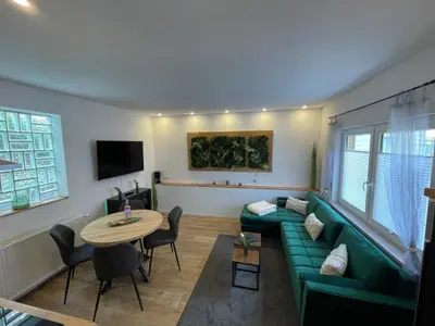 TV/Unterhaltungsangebot in der Unterkunft Komfort Apartments am Badepark, Modern! Stylisch! Geräumig!