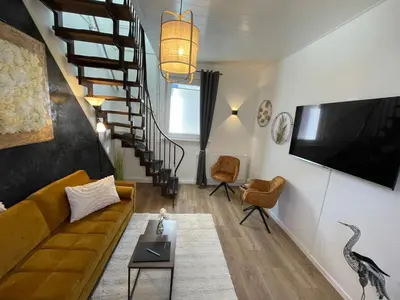 TV/Unterhaltungsangebot in der Unterkunft Komfort Apartments am Badepark, Modern! Stylisch! Geräumig!