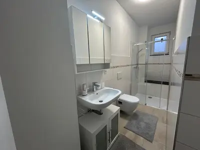 Ein Badezimmer in der Unterkunft Apartments am Berg