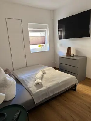 Ein Bett oder Betten in einem Zimmer der Unterkunft Lous Chalet