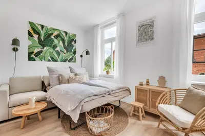 Ein Sitzbereich in der Unterkunft REGIOHOTEL Am Nicolaiplatz Wernigerode - #Ferienwohnungen #FrischRenoviert #Kaffeevollautomat #Bestlage