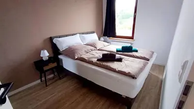 Ein Bett oder Betten in einem Zimmer der Unterkunft Jessis Harz Appartements