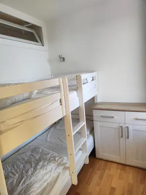Ein Bett oder Betten in einem Zimmer der Unterkunft Apartment Wanderslust im Harz mit Pool & Sauna