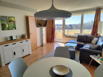 Ein Sitzbereich in der Unterkunft Apartment Wanderslust im Harz mit Pool & Sauna