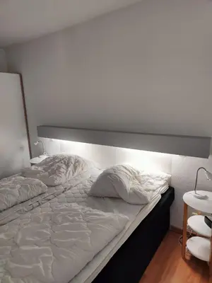 Ein Bett oder Betten in einem Zimmer der Unterkunft Apartment Wanderslust im Harz mit Pool & Sauna