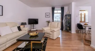 Ein Sitzbereich in der Unterkunft Harz Huus Apartments 