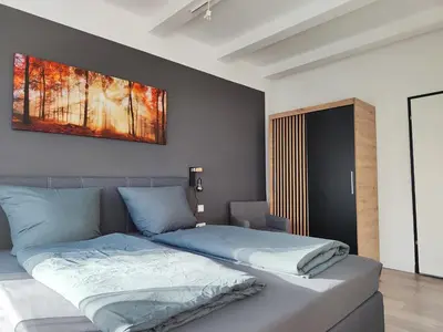 Ein Bett oder Betten in einem Zimmer der Unterkunft Concordia Harzapart