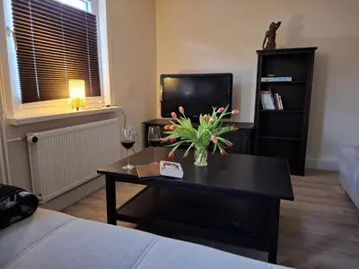 Ein Bett oder Betten in einem Zimmer der Unterkunft FeBo am Wolfsgarten