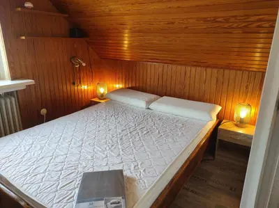 Ein Bett oder Betten in einem Zimmer der Unterkunft Ferienwohnung Harz de Luchs
