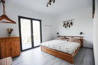 Ein Bett oder Betten in einem Zimmer der Unterkunft NEU Inner Light, mit privater Sauna und schnellen Internet, Luxuriöses Ferienhaus im Harz
