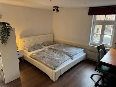 Ein Bett oder Betten in einem Zimmer der Unterkunft Unterkunft im Zentrum der Stadt
